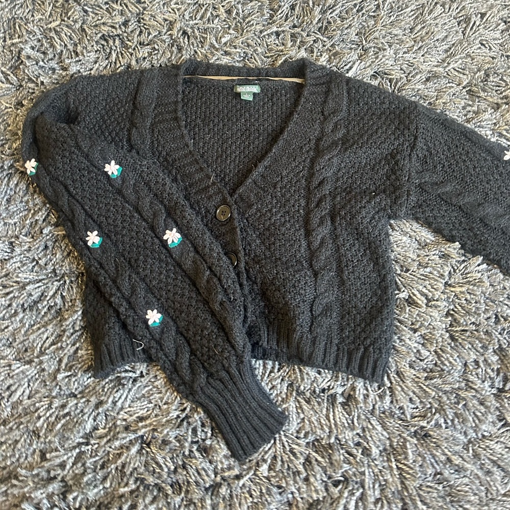 black sweater with embroidered flowers